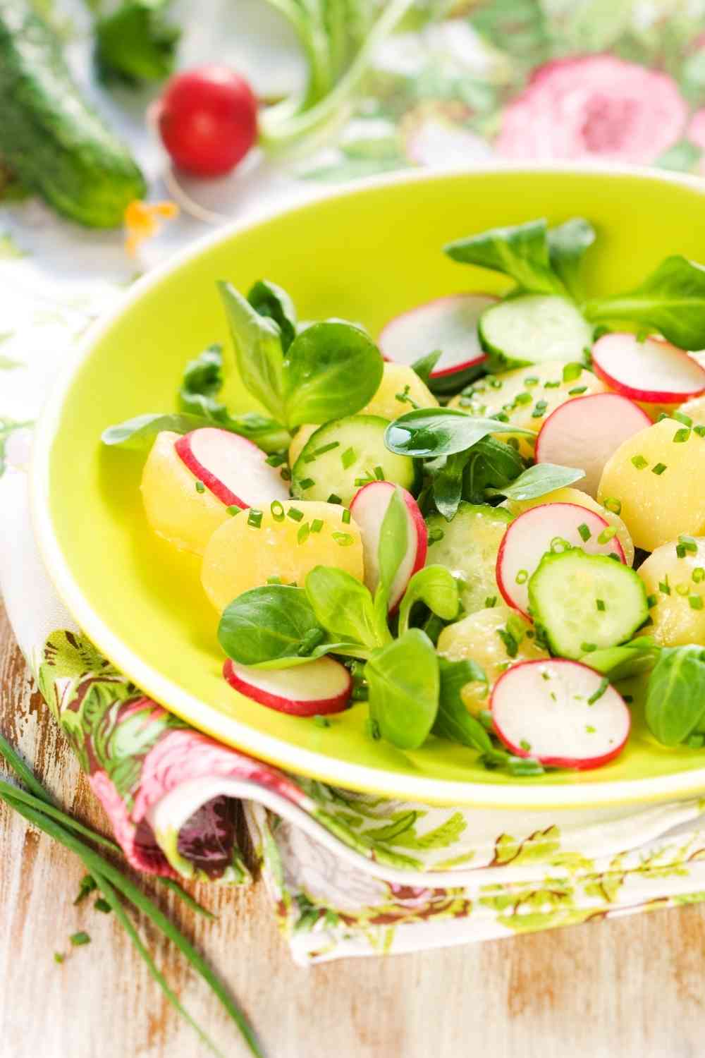 Herb potato salad with asparagus and radish