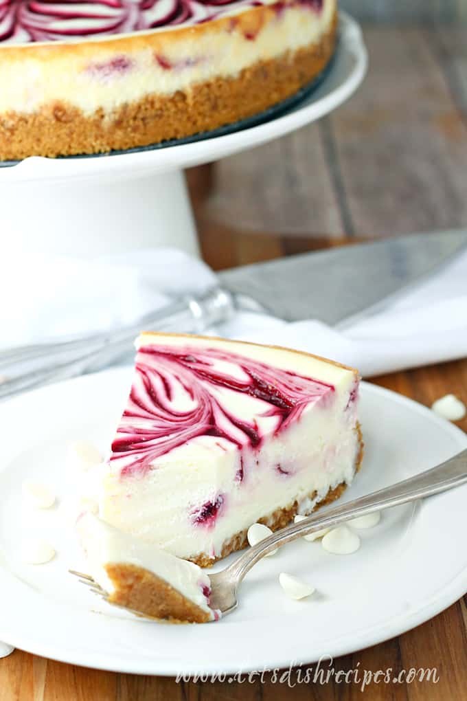 White chocolate cheesecake with strawberry swirls